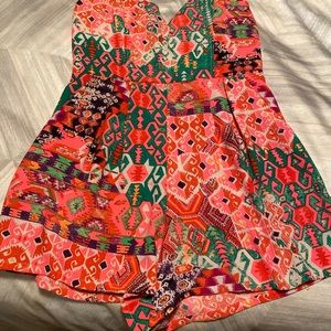 Hot pink strapless romper with pockets, size S, gently worn.